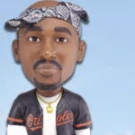 Tupac Shakur’s Baltimore History Honored With Custom Orioles Bobblehead