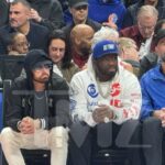 Eminem Brings Fellow Rapper 50 Cent To Pistons game